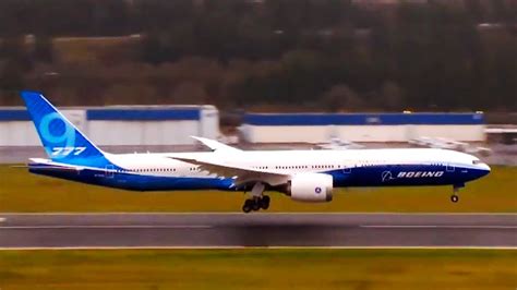 Watch Boeing 777X touch down and fold its wing tips after.